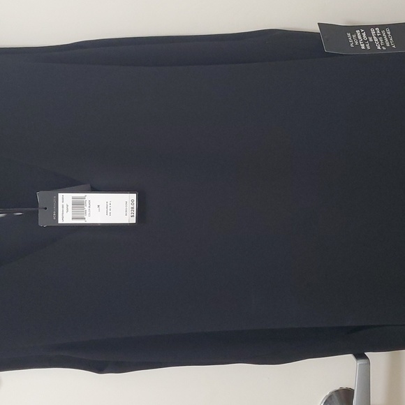 Black sleeveless shirt with silver beading. - Picture 1 of 4